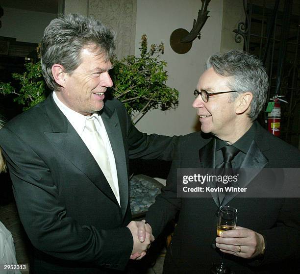 Composers David Foster and Howard Shore arrive at the Warner Music Group's Post-Grammy party at Katana on February 8, 2004 in West Hollywood,...