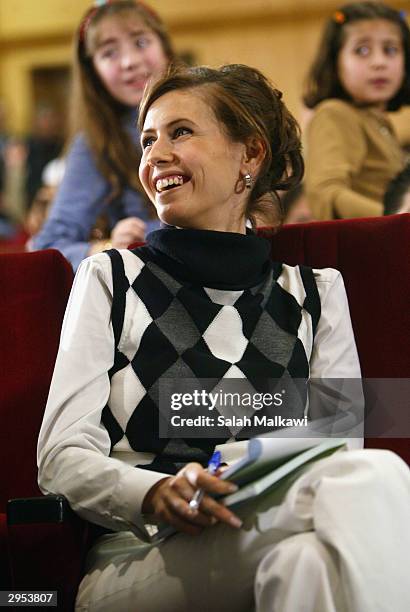 Asmaa al-Assad, wife of the Syrian President attends the first national childhood conference, February 9, 2004 in Aleppo in the north of Syria. In...