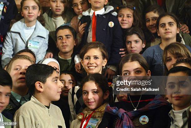 Asmaa al-Assad , wife of the Syrian President attends the first national childhood conference, February 9, 2004 in Aleppo in the north of Syria. In...