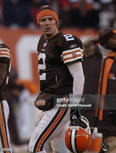 Quarterback Tim Couch of the Cleveland Browns watches from the sidelines during the game against the Baltimore Ravens at Cleveland Browns Stadium on...