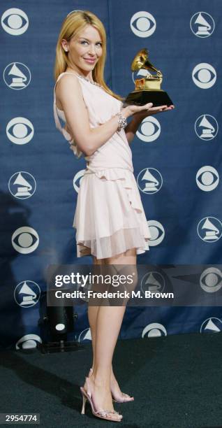 Winner of best Dance Recording Musical Artist Kylie Minogue poses backstage in the Pressroom at the 46th Annual Grammy Awards held on February 8,...