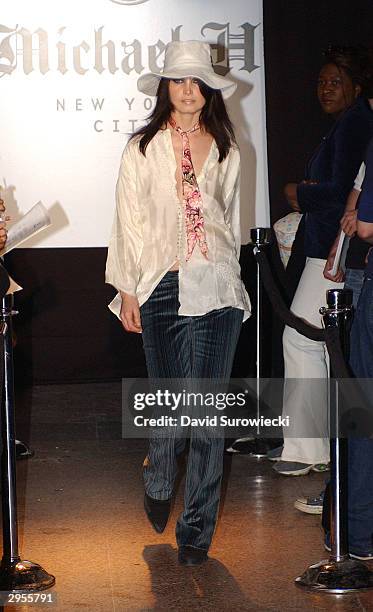 Model walks the runway at the Michael H Fall 2004 fashion show during the Olympus Fashion Week Fall 2004 at Don Hills February 8, 2004 in New York...