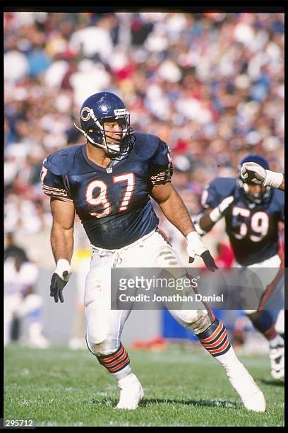 Defensive tackle Chris Zorich of the Chicago Bears runs down the field during a game against the Houston Oilers at Soldier Field in Chicago,...