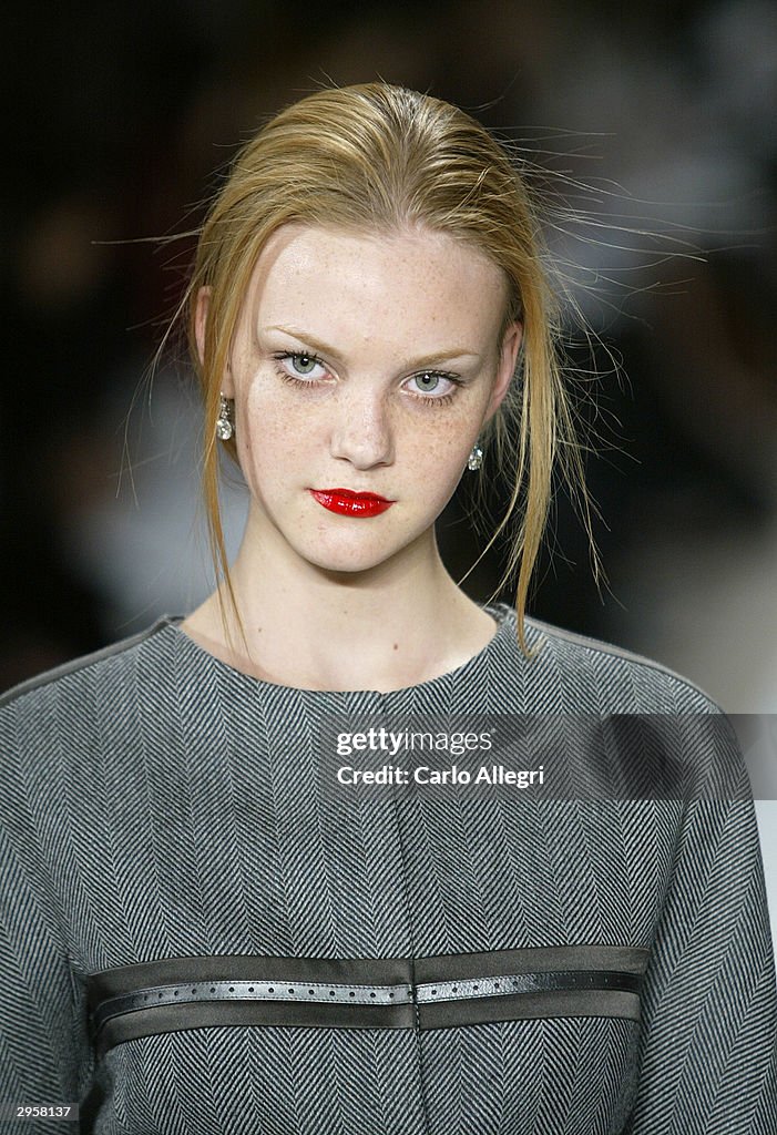 A model walks the runway at the Badgley Mischka Fall 2004 fashion ...