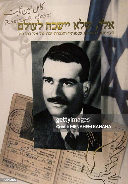 -- File picture dated shows a new postage stamp commemorating Eli Cohen, reading "Eli will never be forgotten." The widow of Cohen, Nadia, hanged in...
