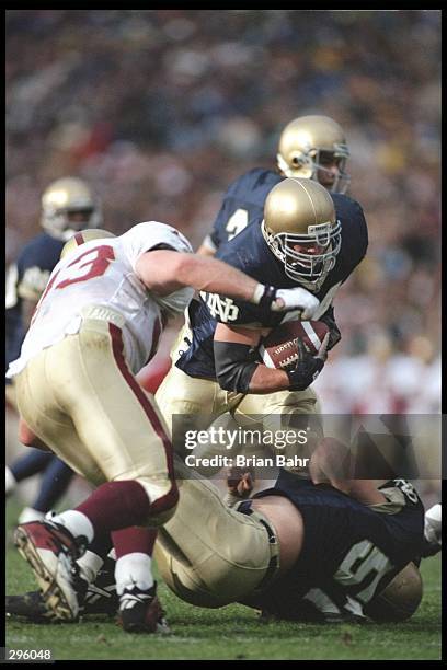 Runningback Marc Edwards of the Notre Dame Fight Irish tries to break through the defensive during a game against the Boston College at Notre Dame...