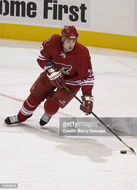 Paul Mara of the Phoenix Coyotes controls the puck against the Los Angeles Kings on December 31, 2003 at Glendale Arena in Glendale, Arizona. The...