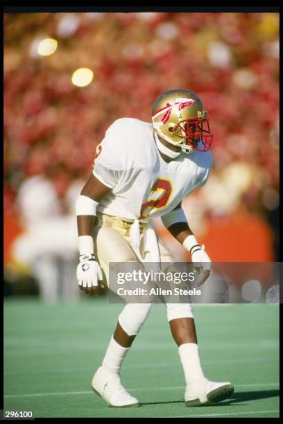 Cornerback Deion Sanders of the Florida State Seminoles stands in position during a game against the Florida Gators at Florida Field in Gainesville,...