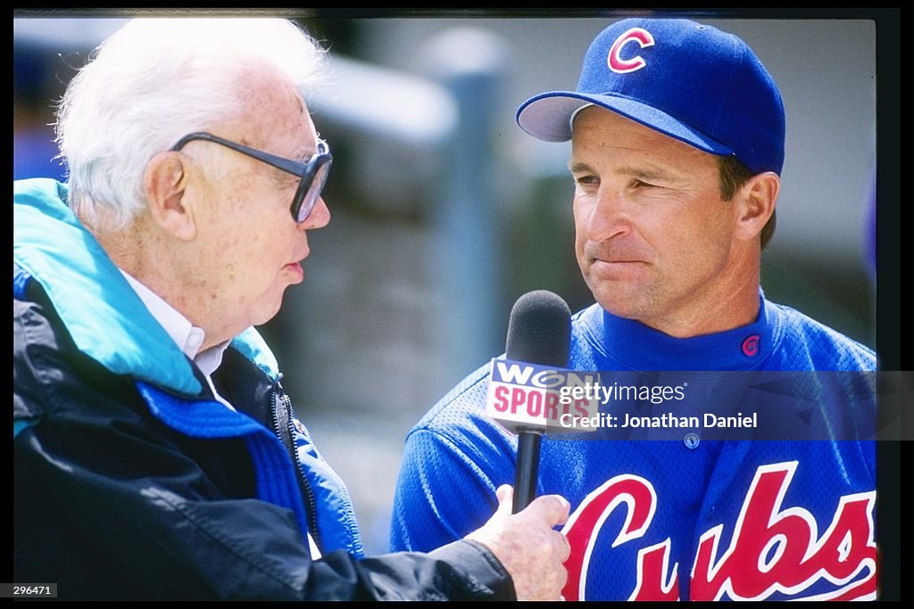 James Riggleman Manager Jim Riggleman of the Chicago Cubs speaks with reporter Harry ...