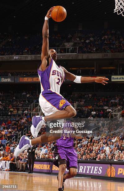 Joe Johnson of the Phoenix Suns dunks against the Toronto Raptors on February 10, 2004 at America West Arena in Phoenix, Arizona. NOTE TO USER: User...