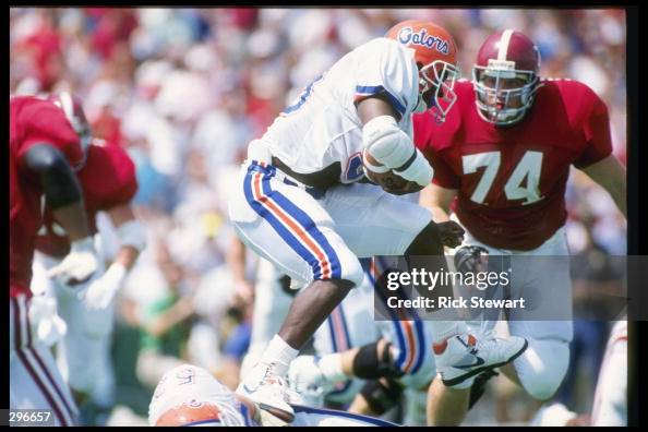 Errict Rhett Florida Running back Erict Rhett of the Florida Gators tries to avoid tackles ...