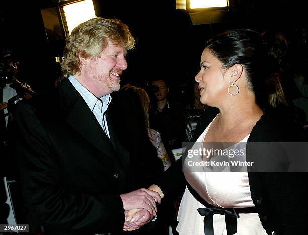 Director Donald Petrie and actress Marcia Gay Harden arrive at the premiere of "Welcome to Mooseport" at the Village Theater on February 10, 2004 in...