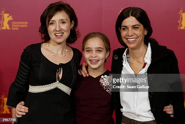 Italian actress Nicoletta Braschi , actress Camille Dugay Comencini and director Francesca Comencini attend the photocall to "I Like to Work " at the...