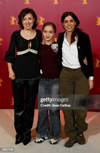 Italian actress Nicoletta Braschi , actress Camille Dugay Comencini and director Francesca Comencini attend the photocall to "I Like to Work " at the...