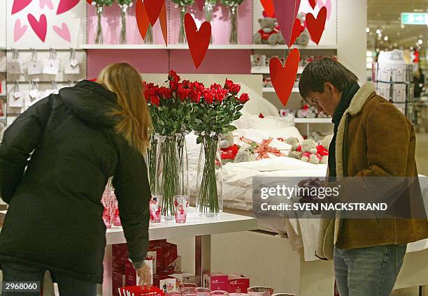 People look for Valentine gifts at a Stockholm department store 11 February 2004, in preparation for St. Valentine's Day on 14 February. Valentine's...