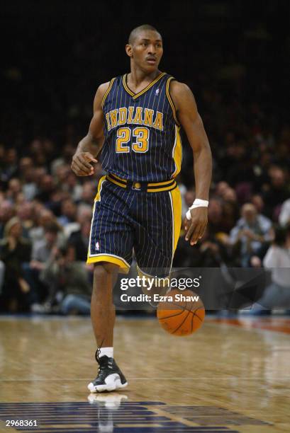 Ron Artest of the Indiana Pacers moves the ball up court during the game against the New York Knicks at Madison Square Garden on February 3, 2004 in...