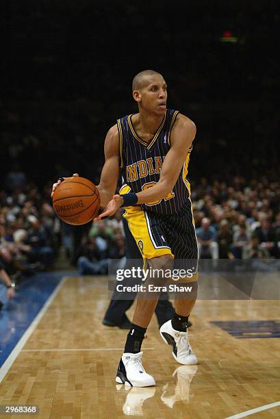 Reggie Miller of the Indiana Pacers looks to pass the ball during the game against the New York Knicks at Madison Square Garden on February 3, 2004...