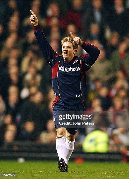 Juninho of Middlesbrough celebrates scoring the first goal during the FA Premiership match between Manchester United and Middlesbrough at Old...