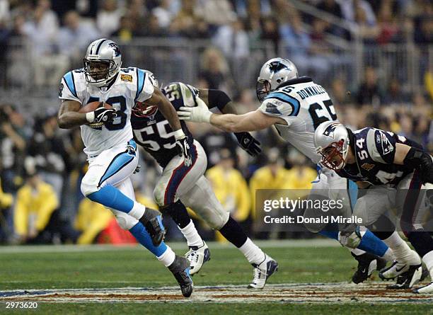 Running back Stephen Davis of the Carolina Panthers runs the football against the New England Patriots during Super Bowl XXXVIII at Reliant Stadium...