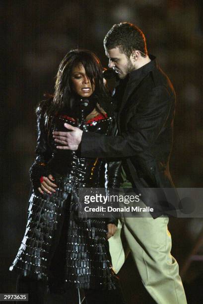 Singers Janet Jackson and Justin Timberlake perform during the halftime show at Super Bowl XXXVIII between the New England Patriots and the Carolina...