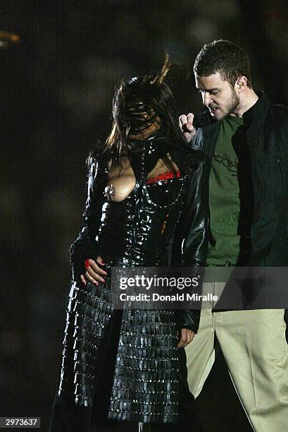 Singers Janet Jackson and Justin Timberlake perform during the halftime show at Super Bowl XXXVIII between the New England Patriots and the Carolina...