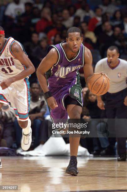 Michael Redd of the Milwaukee Bucks advances the ball upcourt against the Memphis Grizzlies during the game at The Pyramid on February 6, 2004 in...