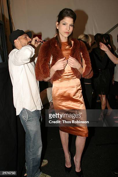 Models get ready backstage at the Jeffrey Chow Fall 2004 during Olympus Fashion Week February 12, 2004 in New York City.