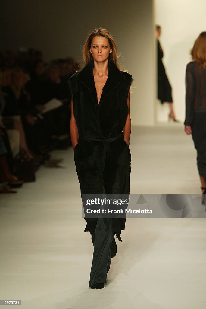 Model Carmen Kass walks the runway at the Calvin Klein Fall 2004 ...