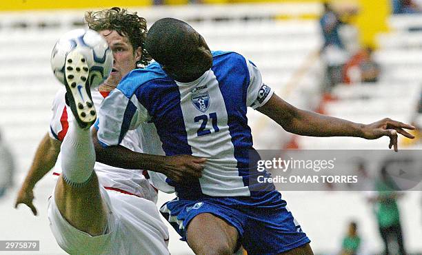 Logan Pause of US shoots the ball in front of Jerry Palacios of Honduras during the Under 23 Preolympic third place soccer match at the Jalisco...