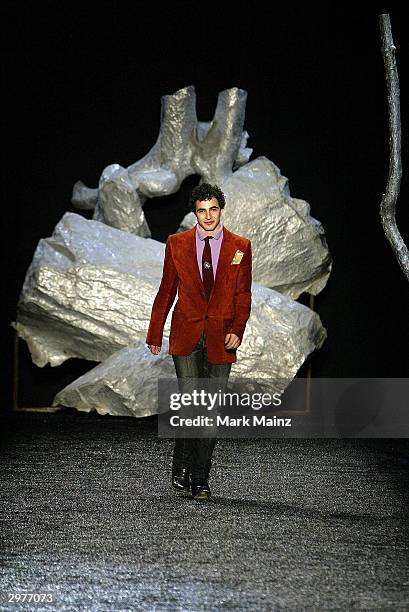 Designer Zac Posen closes the runway at the Zac Posen fashion show during Olympus Fashion Week at Bryant Park February 12, 2004 in New York City.