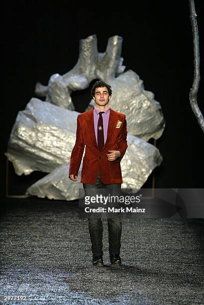 Designer Zac Posen closes the runway at the Zac Posen fashion show during Olympus Fashion Week at Bryant Park February 12, 2004 in New York City.
