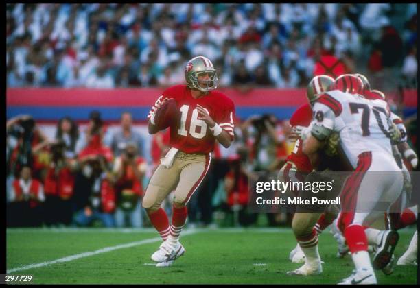 Quarterback Joe Montana of the San Francisco 49ers is looking to pass during the Super Bowl XXIII game against the Cincinnati Bengals at the Joe...