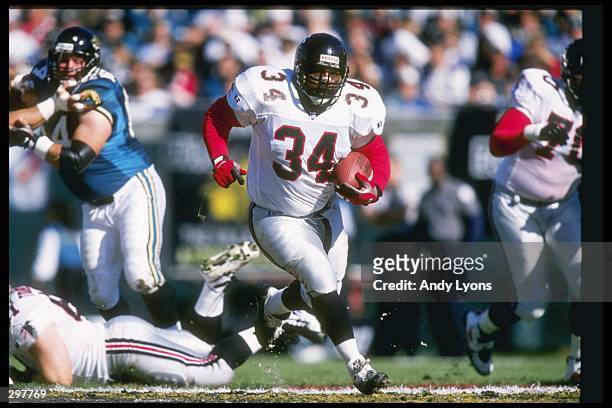 Running back Craig Heyward of the Atlanta Falcons moves the ball during a game against the Jacksonville Jaguars at the Jacksonville Municipal Stadium...