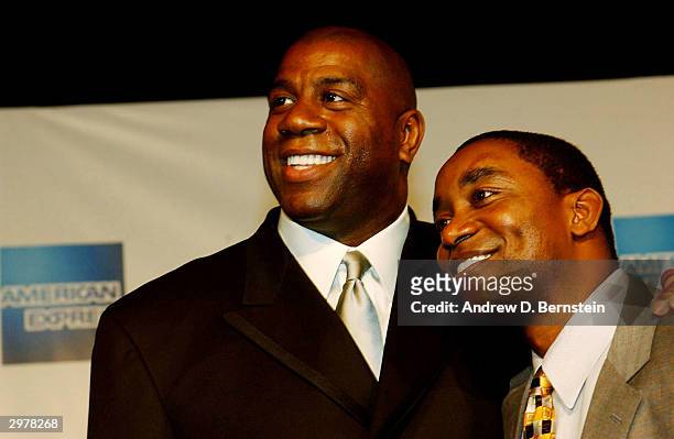 Magic Johnson and Isiah Thomas pose for photos on the red carpet during the American Express Celebrates the Rewarding Life of Earvin Johnson event on...
