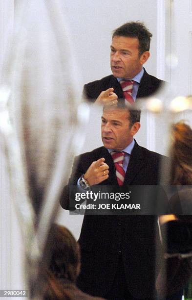 Reflecting on a mirror, Austrian far-right firebrand Joerg Haider speaks to foreign correspondents at his office in the southern province of...