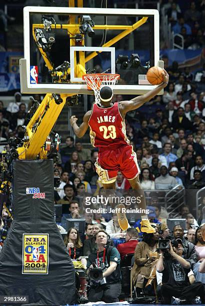 LeBron James of the Rookie Team dunks during the Got Milk? Rookie Game on February 13, 2004 at the Staples Center in Los Angeles, California. NOTE TO...