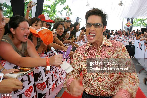 Asia VJ Utt arrives at the "MTV Asia Awards 2004" at the Singapore Indoor Stadium on February 14, 2004 in Singapore. The third annual awards feature...