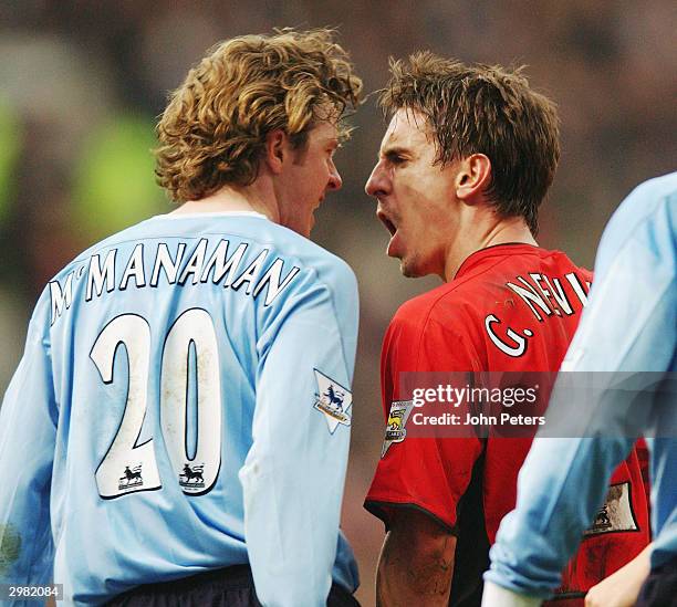 Gary Neville of Manchester United clashes with Steve McManaman of Manchester City during the AXA FA Cup match between Manchester United and...