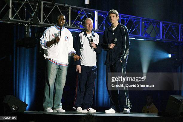 Inside Stuff host Ahmad Rashad with Mike Dunleavy Sr. And Mike Dunleavy Jr. During the 2004 Read To Achieve Celebration at the Los Angeles Convention...