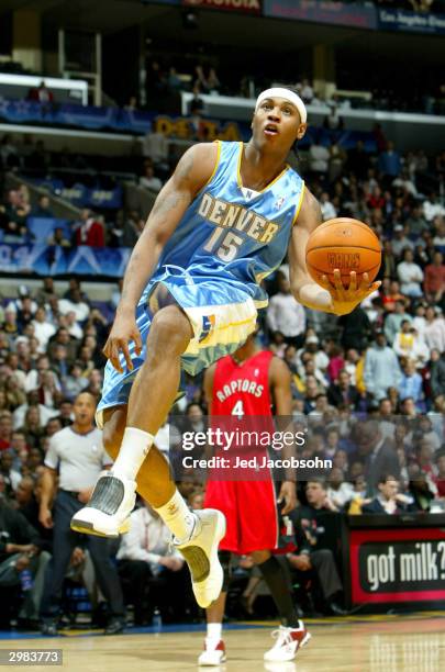 Carmelo Anthony from the Denver Nuggets of the Rookie Team goes to the basket during the Got Milk? Rookie Challenge, part of the 53rd NBA All-Star...
