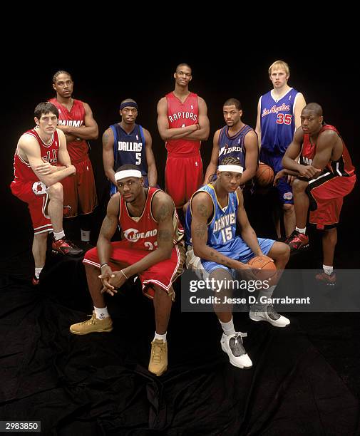 Udonis Haslem, Josh Howard, Chris Bosh, Jarvis Hayes, Chris Kaman, Dwyane Wade, Kirk Hinrich, Lebron James, Carmelo Anthony of the Rookie Team pose...