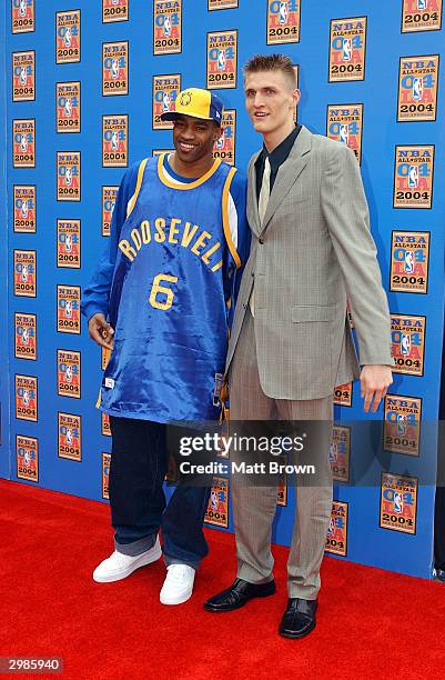 Vince Carter of the Toronto Raptors and Andrei Kirilenko of the Utah Jazz arrive at the 2004 NBA All-Star Game on February 15, 2004 at the Staples...