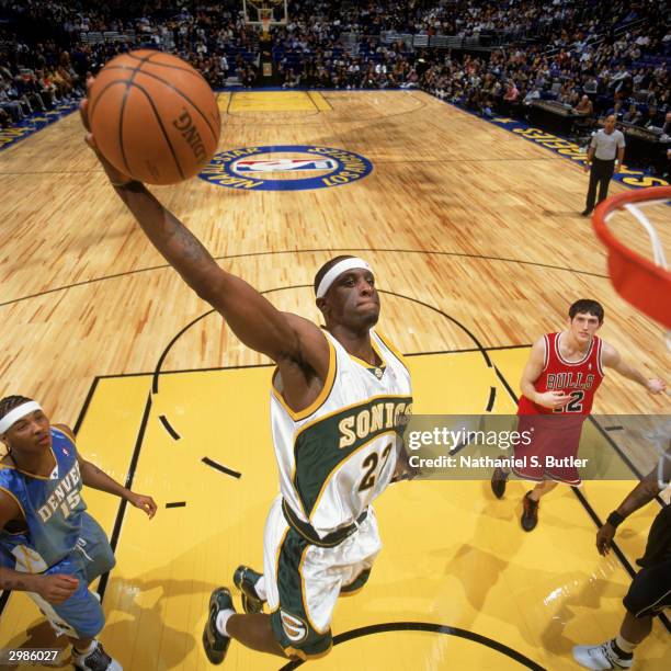 Ronald Murray of the Sophomore Team dunks against the Rookie Team during the Got Milk? Rookie Challenge at Staples Center on February 13, 2004 in Los...