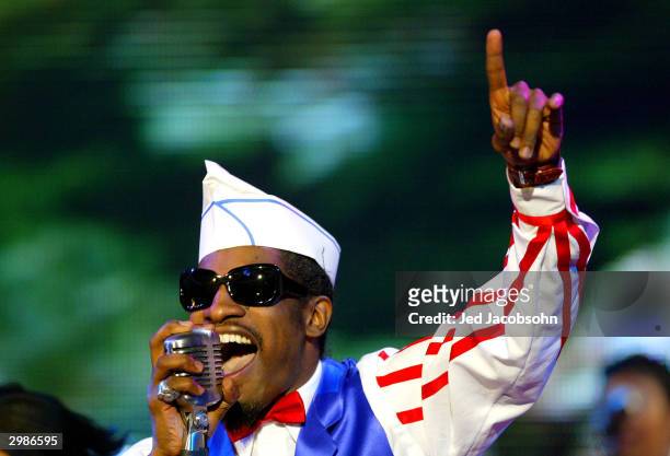 Hip hop artist Andre 3000 of Outkast performs during the 2004 NBA All-Star Pre-Game on February 15, 2004 at the Staples Center in Los Angeles,...