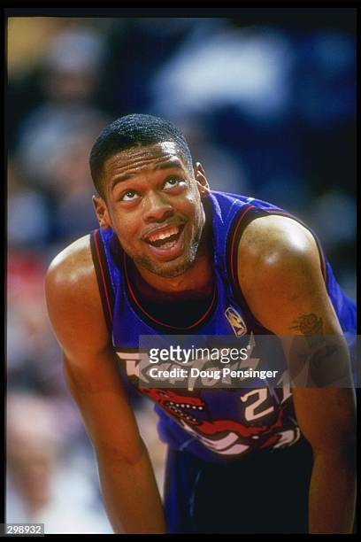 Center Marcus Camby of the Toronto Raptor''s rests during a game against the Washington Bullets at the US Air Arena in Landover, Maryland. The...