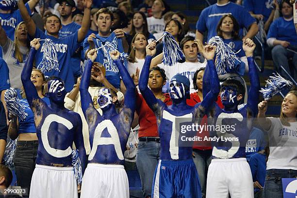 Fans of the Kentucky Wildcats show their support for their team during the game against the Louisville Cardinals on December 27, 2003 at Rupp Arena...