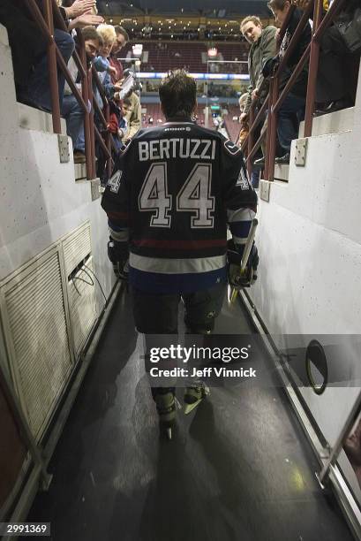 Todd Bertuzzi of the Vancouver Canucks is greeted by fans as he makes his way to the ice rink prior to the game against the Dallas Stars at General...