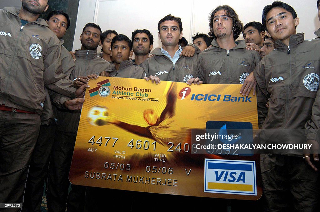 How To Get Mohun Bagan Club Membership Indian players of the Mohun Bagan football club hold a sample of a