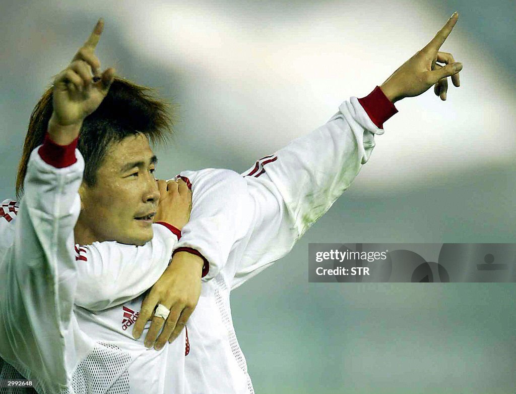 China's Hao Haidong celebrates with an u