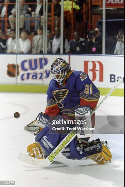 Goalie Grant Fuhr of the St. Louis Blues in action during the NHL Playoffs Round 1 game against the Los Angeles Kings at the Great Western Forum in...
